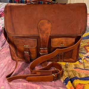 Genuine leather traditional briefcase. Lots of storage. All brass hardware! NEW!